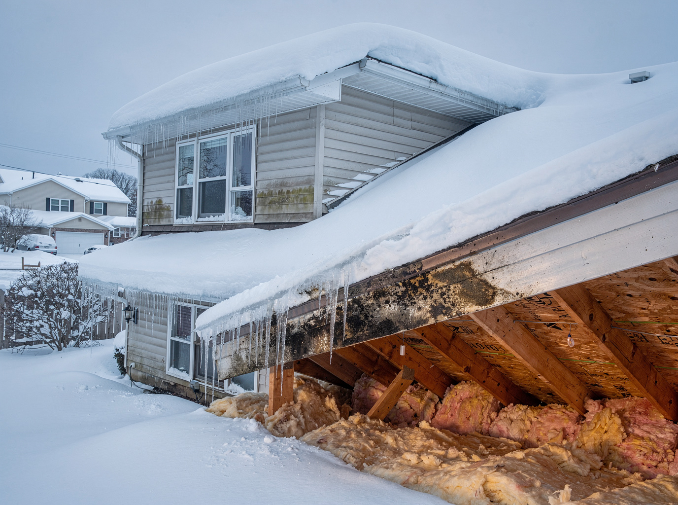 How Ice Dams Form Attic Mold in Rochester Winters